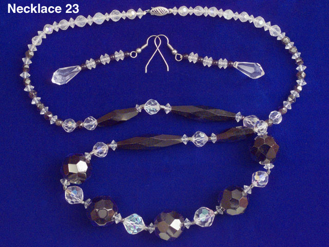 25" Necklace of Black and Clear Faceted Glass Beads and Matching Earrings