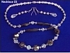 25" Necklace of Black and Clear Faceted Glass Beads and Matching Earrings