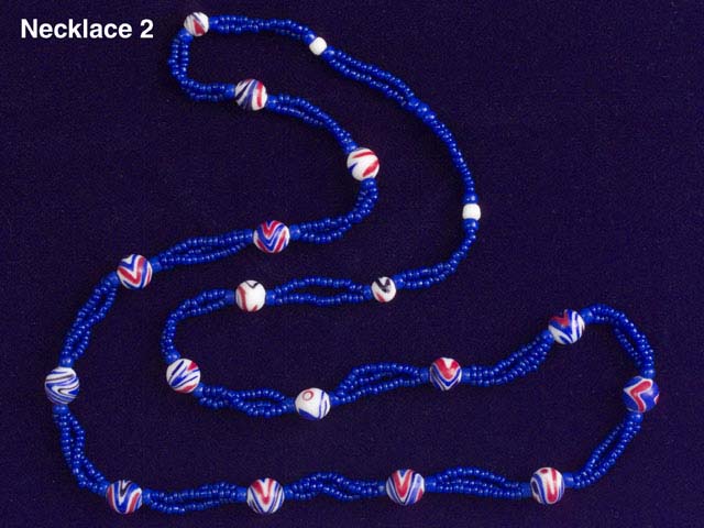 28" Handmade Venetian Glass Necklace utilizing multiple strings of navy blue seed 